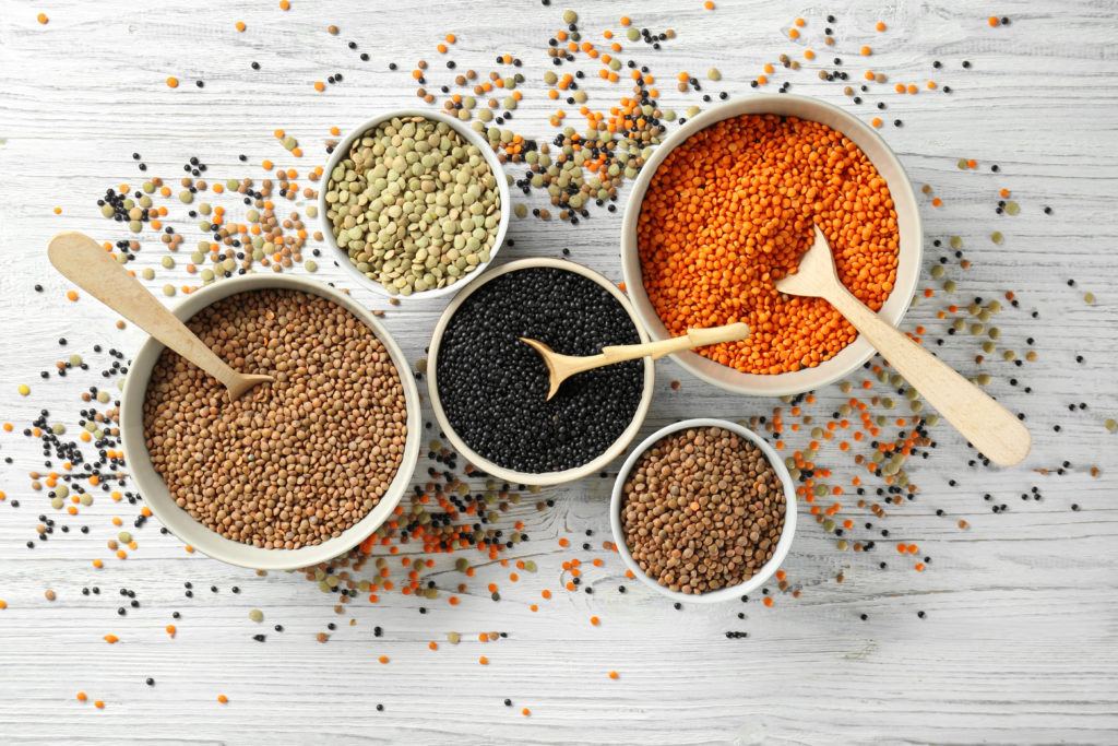 a variety of lentils in bowls